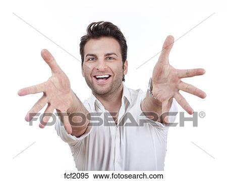 Excited Man In Shirt With Both Arms Outstretched Toward Camera Isolated On White Stock Photography Fcf95 Fotosearch