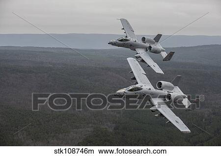 Picture - A-10 Thunderbolt II's flying over Razorback Range, Arkansas.. Fotosearch