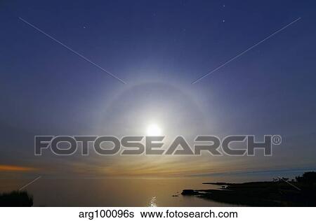 A 22 degrees halo around the 2013 supermoon. View Large Photo Image Stock Photograph - A 22 degrees halo around the 2013 supermoon.. Fotosearch