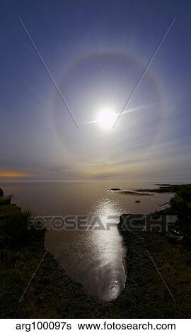 A 22 degrees halo around the 2013 supermoon. View Large Photo Image Stock Photograph - A 22 degrees halo around the 2013 supermoon.. Fotosearch