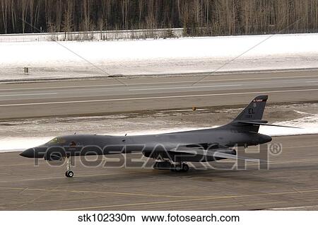 A B-1B Lancer performs a touch and go before landing View Large Photo Image Picture - A B-1B Lancer performs a touch and go before landing. Fotosearch