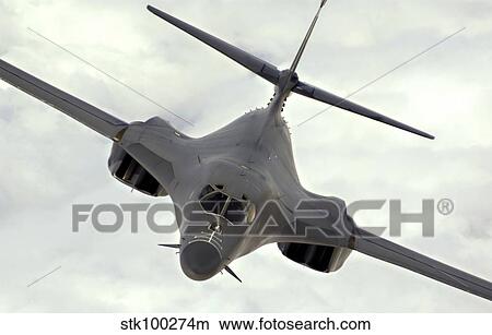 A B-1B Lancer streaks through the sky. View Large Photo Image Picture - A B-1B Lancer streaks through the sky.. Fotosearch