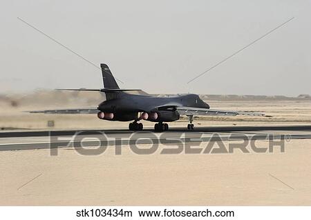 A B-1B Lancer takes off at an air base in Southwest Asia. View Large Photo Image Picture - A B-1B Lancer takes off at an air base in Southwest Asia.. Fotosearch