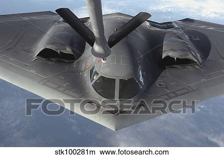 A B-2 Spirit bomber prepares to refuel from a KC-135 Stratotanker. View Large Photo Image Picture - A B-2 Spirit bomber prepares to refuel from a KC-135 Stratotanker.. Fotosearch