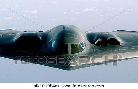 A B-2 Spirit takes on fuel from a KC-135 Stratotanker. View Large Photo Image Picture - A B-2 Spirit takes on fuel from a KC-135 Stratotanker.. Fotosearch