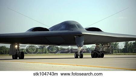 Picture - A B-2 Spirit taxis onto the flightline at Whiteman Air Force Base, Missouri.. Fotosearch