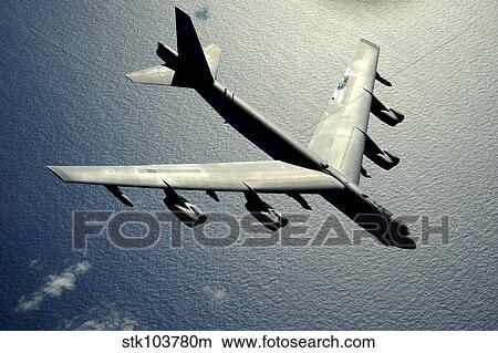 Picture - A B-52 Stratofortress in flight over the Pacific Ocean.. Fotosearch