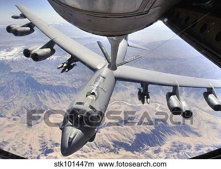 A B-52 Stratofortress receives fuel from a KC-135 Stratotanker over Afghanistan. View Large Photo Image Picture - A B-52 Stratofortress receives fuel from a KC-135 Stratotanker over Afghanistan.. Fotosearch