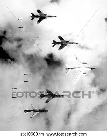 A B-66 Destroyer and F-105 Thunderchief aircraft bomb North Vietnam. View Large Photo Image Picture - A B-66 Destroyer and F-105 Thunderchief aircraft bomb North Vietnam.. Fotosearch