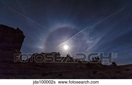 A beautiful moon ring over Arches National Park, Utah. View Large Photo Image Stock Photograph - A beautiful moon ring over Arches National Park, Utah.. Fotosearch