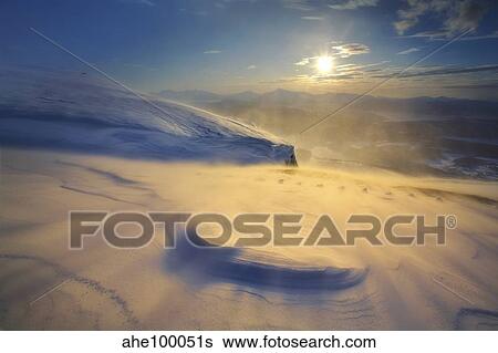 Stock Photograph - A blizzard on Toviktinden Mountain in Troms County, Norway.. Fotosearch