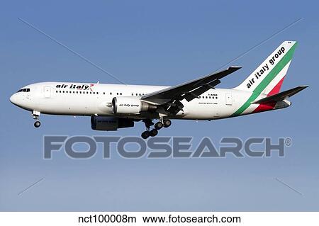 Picture - A Boeing 767 of Air Italy in flight over Italy.. Fotosearch