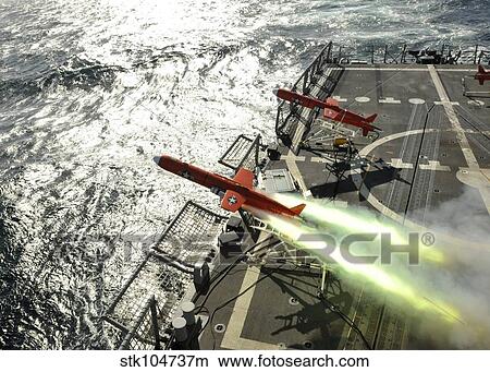 Picture - A BQM-74E aerial drone launches from the guided-missile frigate USS Thach.. Fotosearch