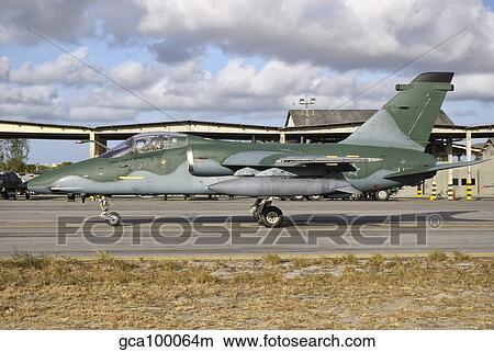 A Brazilian Air Force Embraer A-1A aircraft at Natal Air Force Base, Brazil. View Large Photo Image Picture - A Brazilian Air Force Embraer A-1A aircraft at Natal Air Force Base, Brazil.. Fotosearch