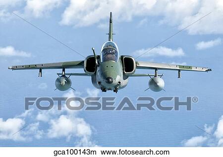 A Brazilian Air Force Embraer A-1B soars through the sky over Brazil. View Large Photo Image Picture - A Brazilian Air Force Embraer A-1B soars through the sky over Brazil.. Fotosearch