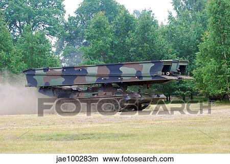 A bridgelayer in use by the Belgium Army. View Large Photo Image Picture - A bridgelayer in use by the Belgium Army.. Fotosearch