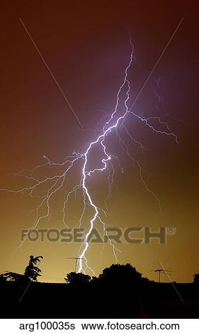 A bright bolt of lightning at the suburbs of Buenos Aires, Argentina. View Large Photo Image Stock Photograph - A bright bolt of lightning at the suburbs of Buenos Aires, Argentina.. Fotosearch