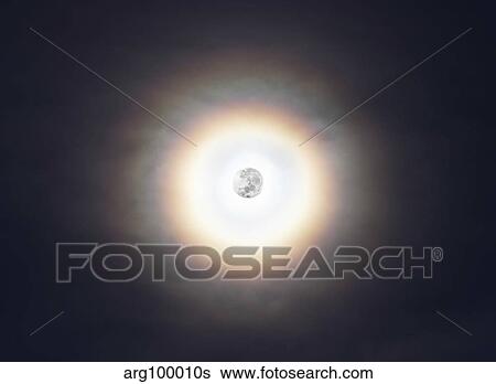 A bright halo around the full moon. View Large Photo Image Stock Photograph - A bright halo around the full moon.. Fotosearch