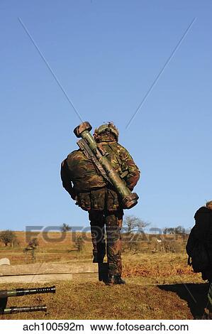 A British soldier carrying a MATADOR light anti-tank weapon. View Large Photo Image Picture - A British soldier carrying a MATADOR light anti-tank weapon.. Fotosearch