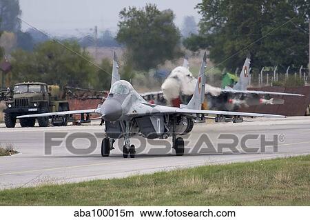 A Bulgarian Air Force MiG-29 taxiing at Graf Ignatievo Air Base, Bulgaria. View Large Photo Image Picture - A Bulgarian Air Force MiG-29 taxiing at Graf Ignatievo Air Base, Bulgaria.. Fotosearch