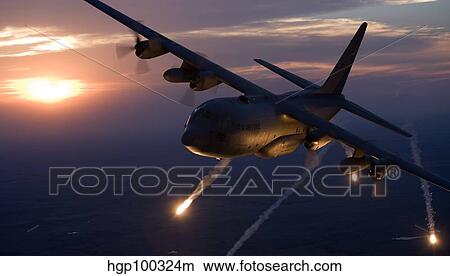 A C-130 Hercules releases flares during a mission over Kansas. View Large Photo Image Picture - A C-130 Hercules releases flares during a mission over Kansas.. Fotosearch