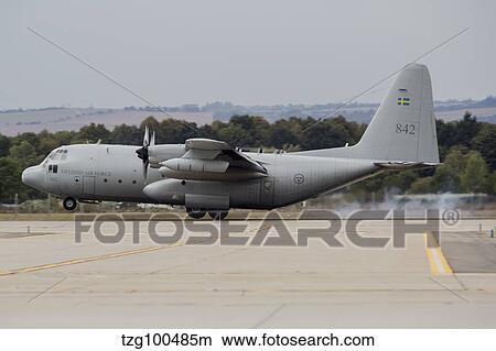 A C-130E Hercules of the Swedish Air Force landing in Ostrava, Czech Republic. View Large Photo Image Picture - A C-130E Hercules of the Swedish Air Force landing in Ostrava, Czech Republic.. Fotosearch