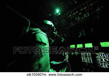 Picture - A C-130J aircraft commander prepares for take off.. Fotosearch
