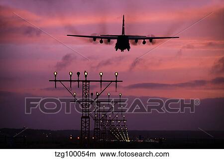 A C-130J Super Hercules landing at Ramstein Air Base, Germany. View Large Photo Image Picture - A C-130J Super Hercules landing at Ramstein Air Base, Germany.. Fotosearch