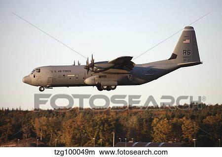 A C-130J Super Hercules prepares for landing at Ramstein Air Base, Germany. View Large Photo Image Picture - A C-130J Super Hercules prepares for landing at Ramstein Air Base, Germany.. Fotosearch