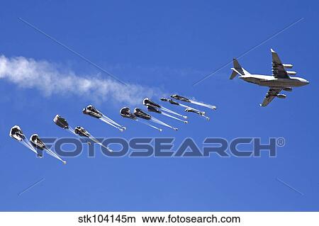Picture - A C-17 Globemaster ejects a supply load of pallets during Operation Koranai Permakhtag.. Fotosearch