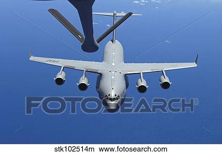 A C-17 Globemaster III approaches the boom of a KC-135 Stratotanker. View Large Photo Image Picture - A C-17 Globemaster III approaches the boom of a KC-135 Stratotanker.. Fotosearch