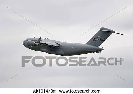 A C-17 Globemaster III in flight. View Large Photo Image Picture - A C-17 Globemaster III in flight.. Fotosearch