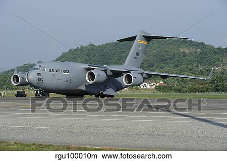 A C-17 Globemaster III of the U. S. Air Force at Langkawi Airport, Malaysia. View Large Photo Image Picture - A C-17 Globemaster III of the U. S. Air Force at Langkawi Airport, Malaysia.. Fotosearch