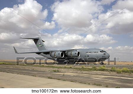 A C-17 Globemaster III on the runway. View Large Photo Image Picture - A C-17 Globemaster III on the runway.. Fotosearch