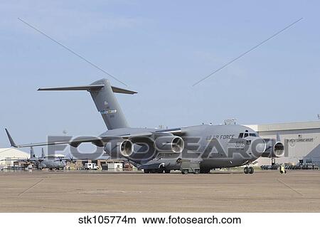 A C-17 Globemaster III parked on the ramp at an Air Force base. View Large Photo Image Picture - A C-17 Globemaster III parked on the ramp at an Air Force base.. Fotosearch