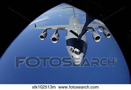 A C-17 Globemaster III receives fuel from a KC-135 Stratotanker. View Large Photo Image Picture - A C-17 Globemaster III receives fuel from a KC-135 Stratotanker.. Fotosearch