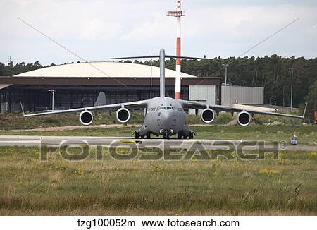A C-17 Globemaster taxiing at Ramstein Air Base, Germany View Large Photo Image Picture - A C-17 Globemaster taxiing at Ramstein Air Base, Germany. Fotosearch