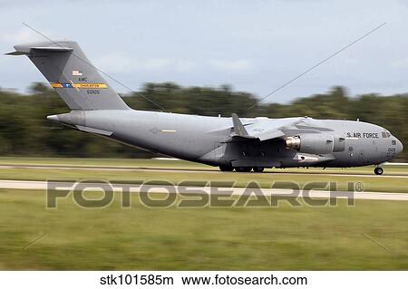 A C-17 takes off from Charleston Air Force Base, South Carolina. View Large Photo Image Picture - A C-17 takes off from Charleston Air Force Base, South Carolina.. Fotosearch