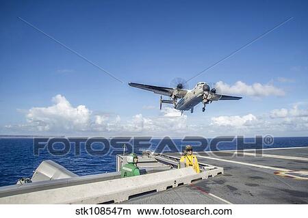A C-2A Greyhound carrying relief supplies. View Large Photo Image Picture - A C-2A Greyhound carrying relief supplies.. Fotosearch