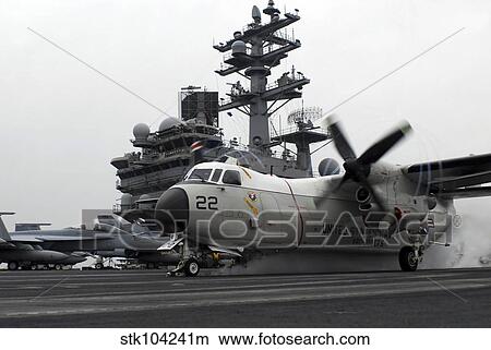 A C-2A Greyhound launches from the aircraft carrier USS Ronald Reagan. View Large Photo Image Picture - A C-2A Greyhound launches from the aircraft carrier USS Ronald Reagan.. Fotosearch
