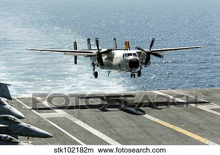 A C-2A Greyhound prepares to land on the flight deck of USS Dwight D. Eisenhower. View Large Photo Image Picture - A C-2A Greyhound prepares to land on the flight deck of USS Dwight D. Eisenhower.. Fotosearch