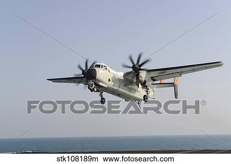 A C-2A Greyhound prepares to land on the flight deck of USS Harry S. Truman. View Large Photo Image Picture - A C-2A Greyhound prepares to land on the flight deck of USS Harry S. Truman.. Fotosearch