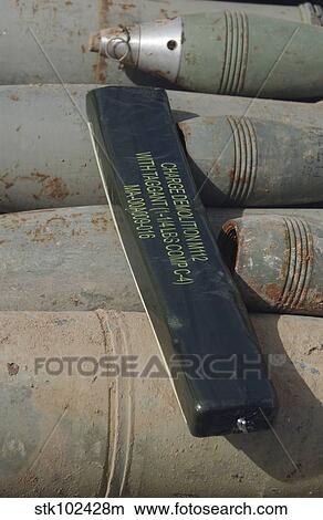 A C-4 explosive placed on a 100 millimeter armor piercing round. View Large Photo Image Picture - A C-4 explosive placed on a 100 millimeter armor piercing round.. Fotosearch