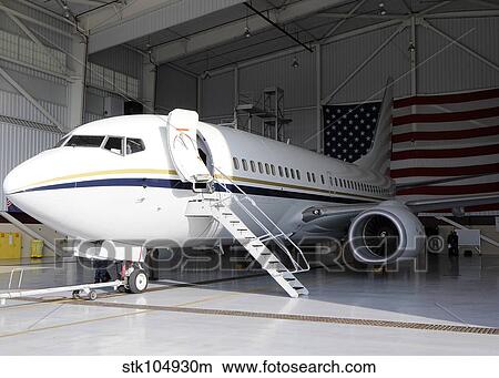 Picture - A C-40 Clipper in a hangar after arriving at Naval Air Station North Island.. Fotosearch