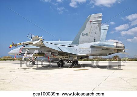 A Canadian Air Force F/A-18 Hornet armed with weapons. View Large Photo Image Picture - A Canadian Air Force F/A-18 Hornet armed with weapons.. Fotosearch