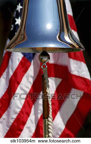 A ceremonial ships bell displayed during a dedication ceremony. View Large Photo Image Picture - A ceremonial ships bell displayed during a dedication ceremony.. Fotosearch