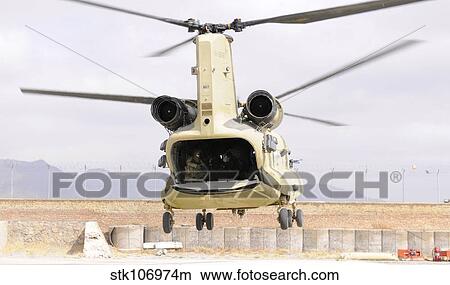 A CH-47 Chinook helicopter transporting wounded warriors. View Large Photo Image Picture - A CH-47 Chinook helicopter transporting wounded warriors.. Fotosearch