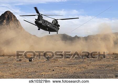 A CH-47 Chinook prepares to land. View Large Photo Image Picture - A CH-47 Chinook prepares to land.. Fotosearch