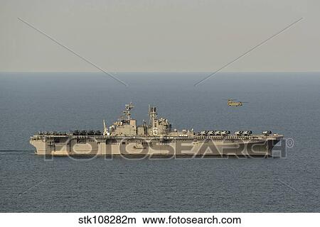 A CH-47F Chinook conducts flight operations with USS Bonhomme Richard. View Large Photo Image Picture - A CH-47F Chinook conducts flight operations with USS Bonhomme Richard.. Fotosearch