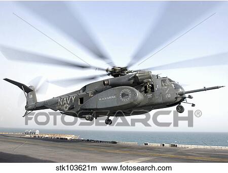 a CH-53 Sea Stallion helicopter leaves the flight deck of USS Kearsarge. View Large Photo Image Picture - a CH-53 Sea Stallion helicopter leaves the flight deck of USS Kearsarge.. Fotosearch